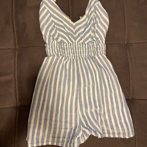 Sky blue & white stripped ROMPER ties in the back